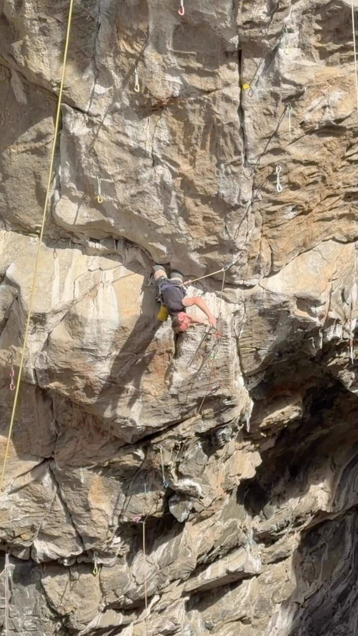 Will Bosi climbing in the roof of Silence in Flatanger