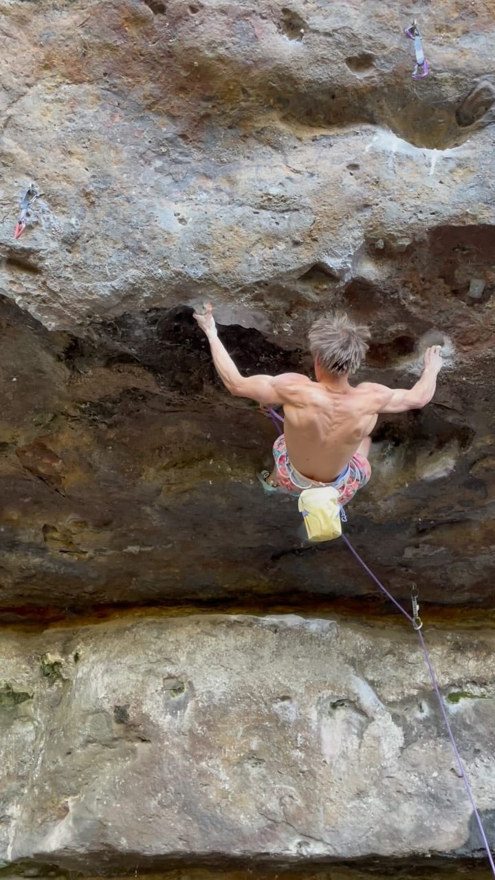 Alexander Megos climbing White Ladder on Australian rock