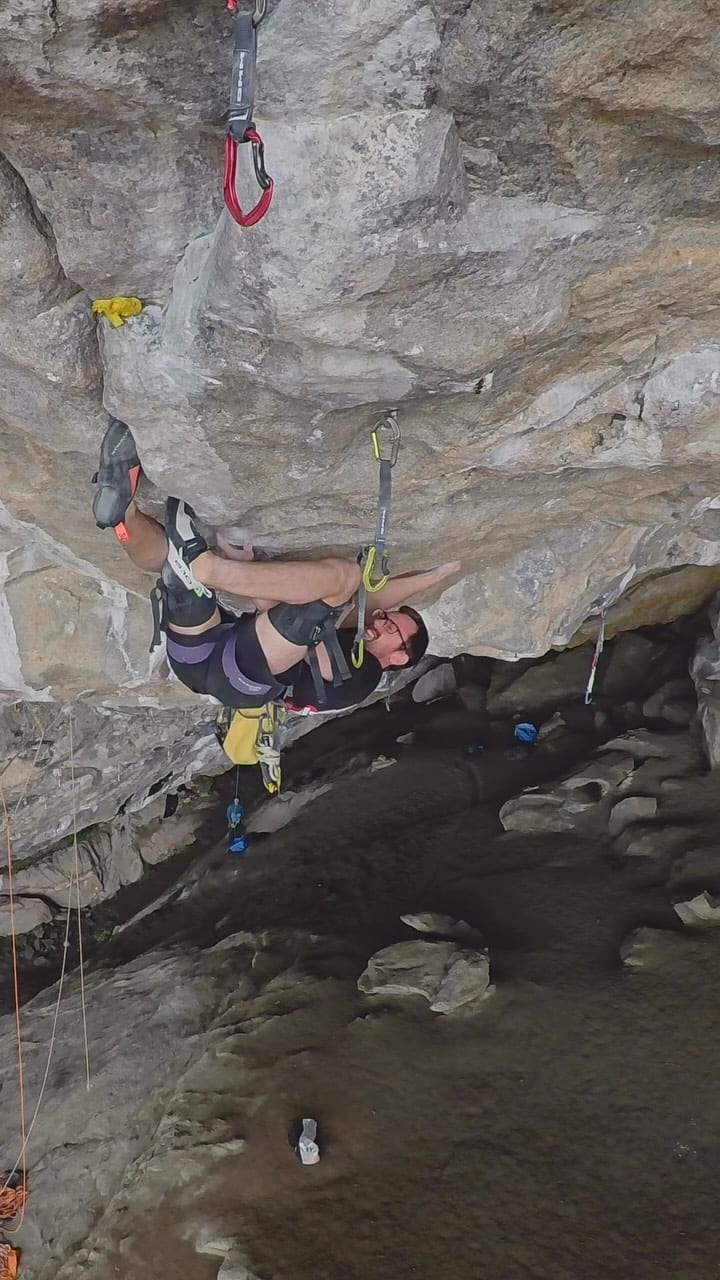 Will Bosi climbing in the steep roof of Silence in Flatanger