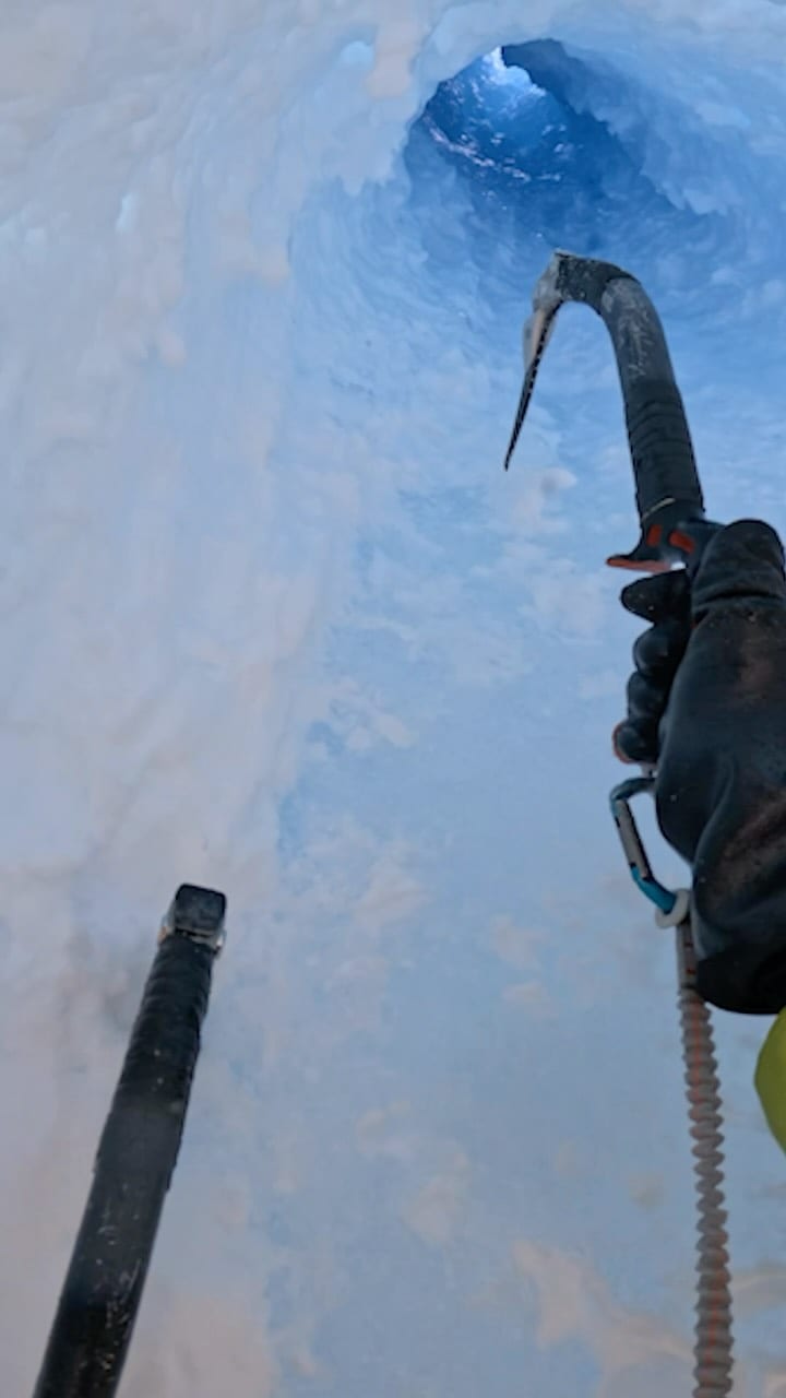 Colin Haley climbing through a tunnel of rime ice on Cerro Torre