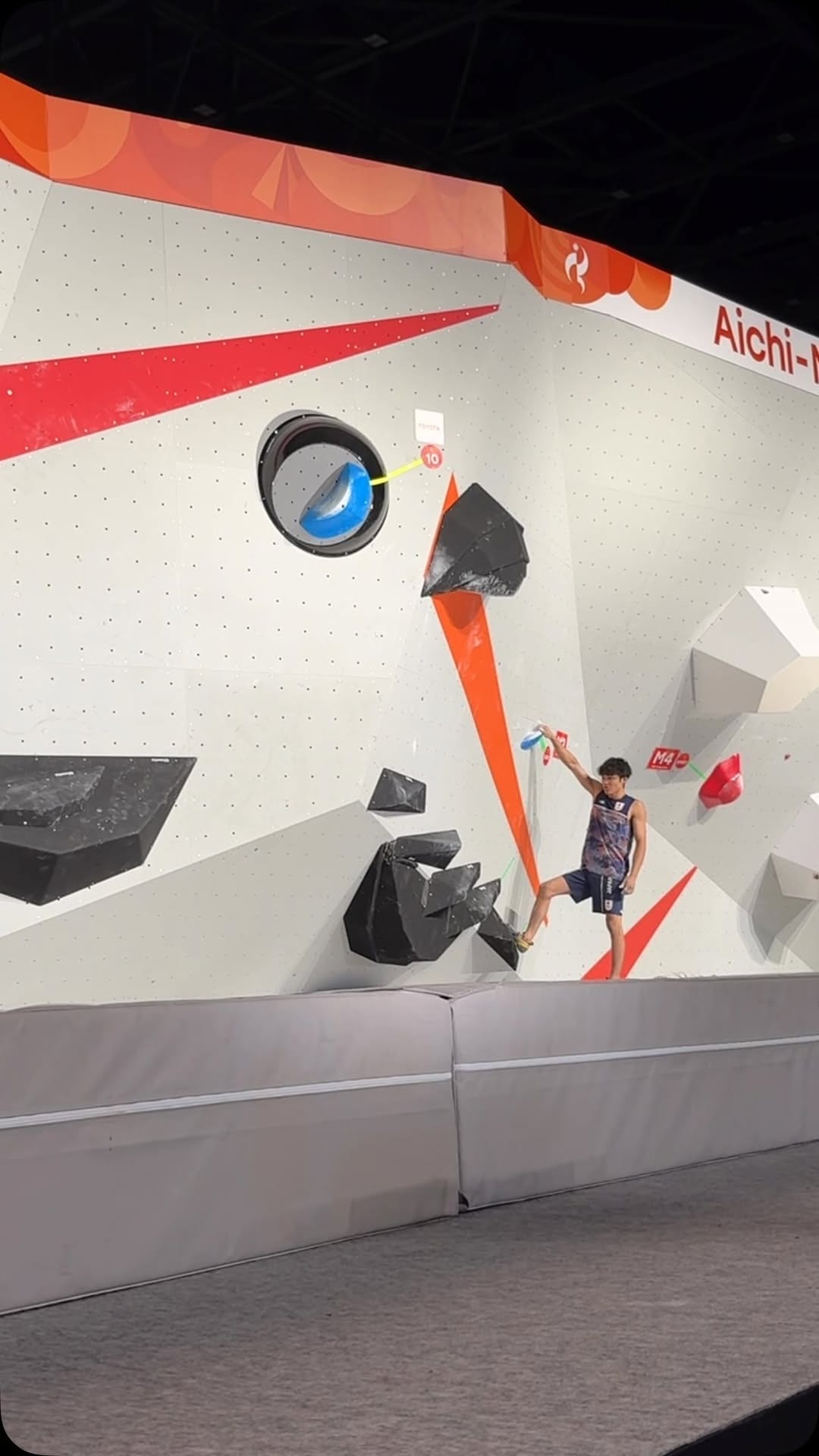 Sorato Anraku on a competition boulder at the Asian Games