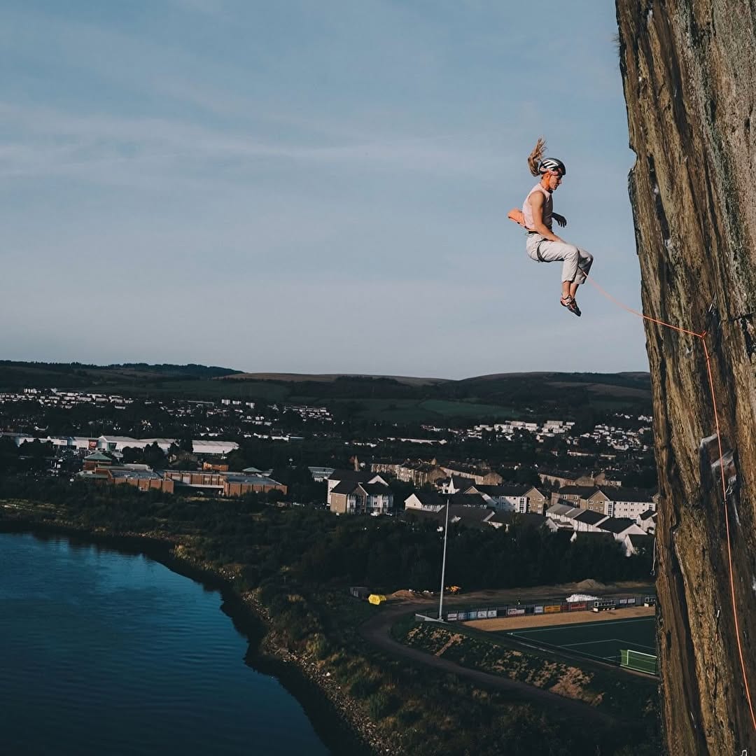 Lara Neumeier climbing Rhapsody at Dumbarton Rock, Scotland
